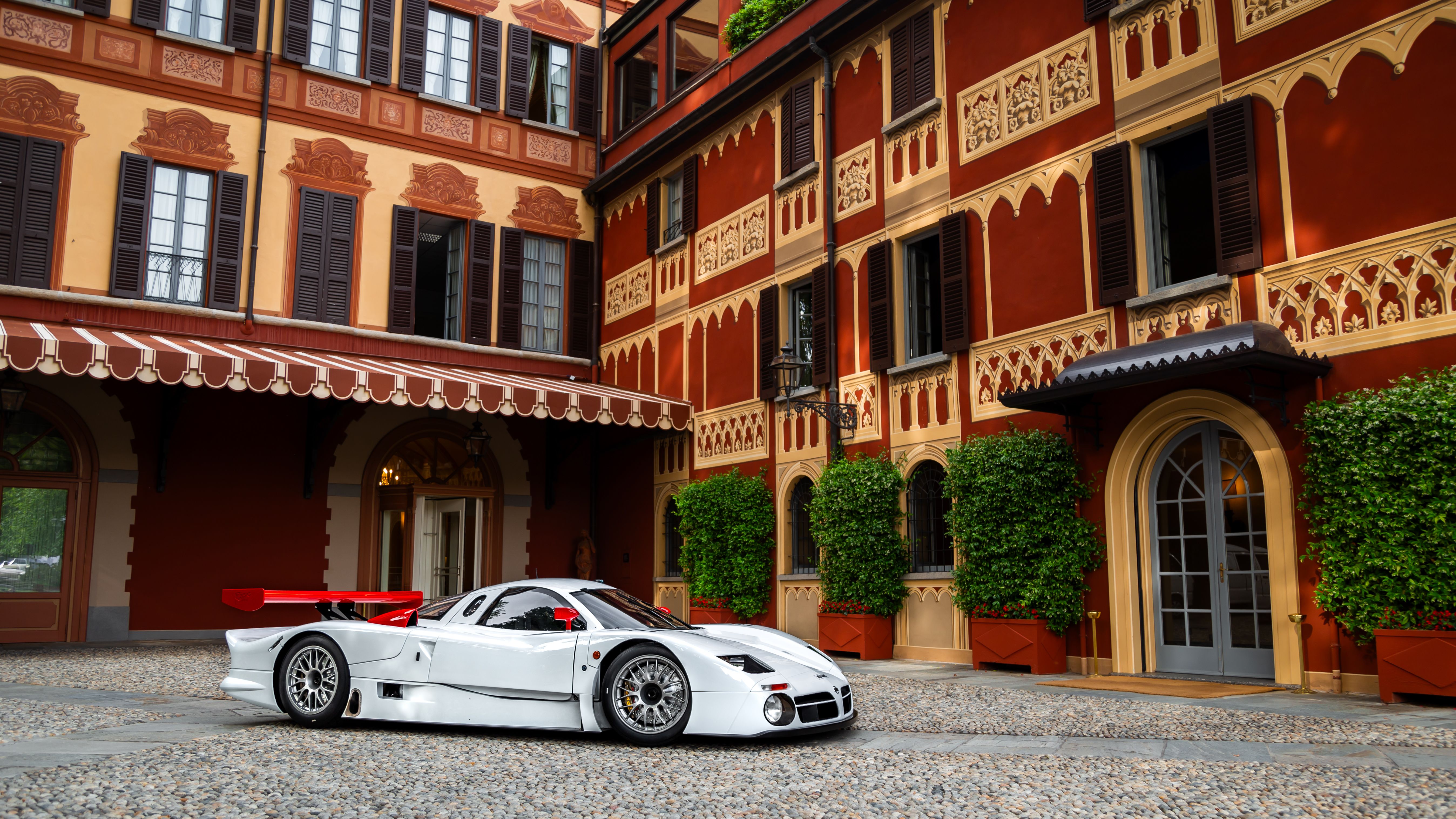 Nissan R390 GT1 front view parked in front of a building